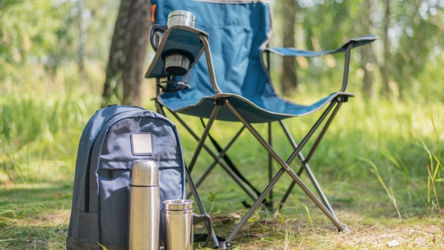 blue backpacking chair and backpack