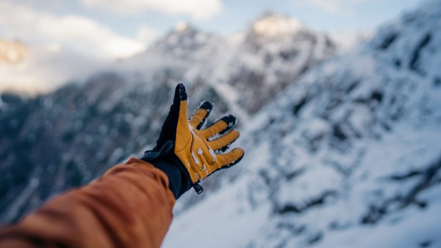 hand with winter hiking gloves